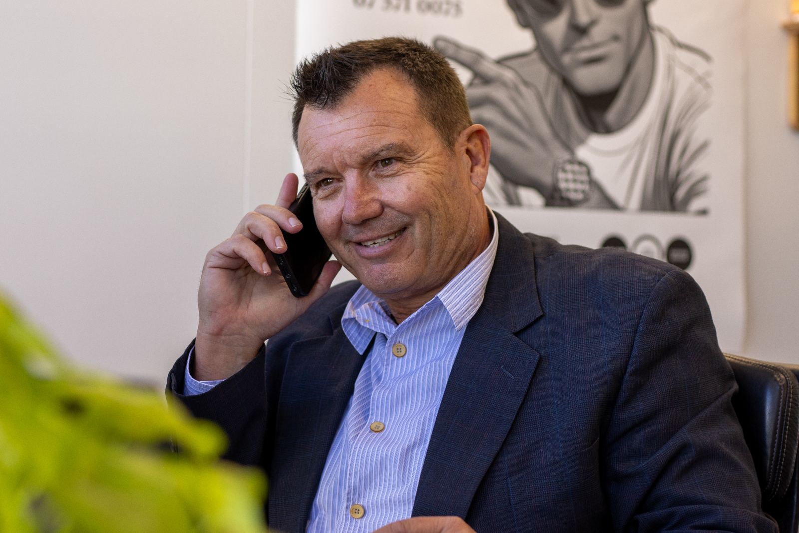 Joe taking a client call in the JOE CA office